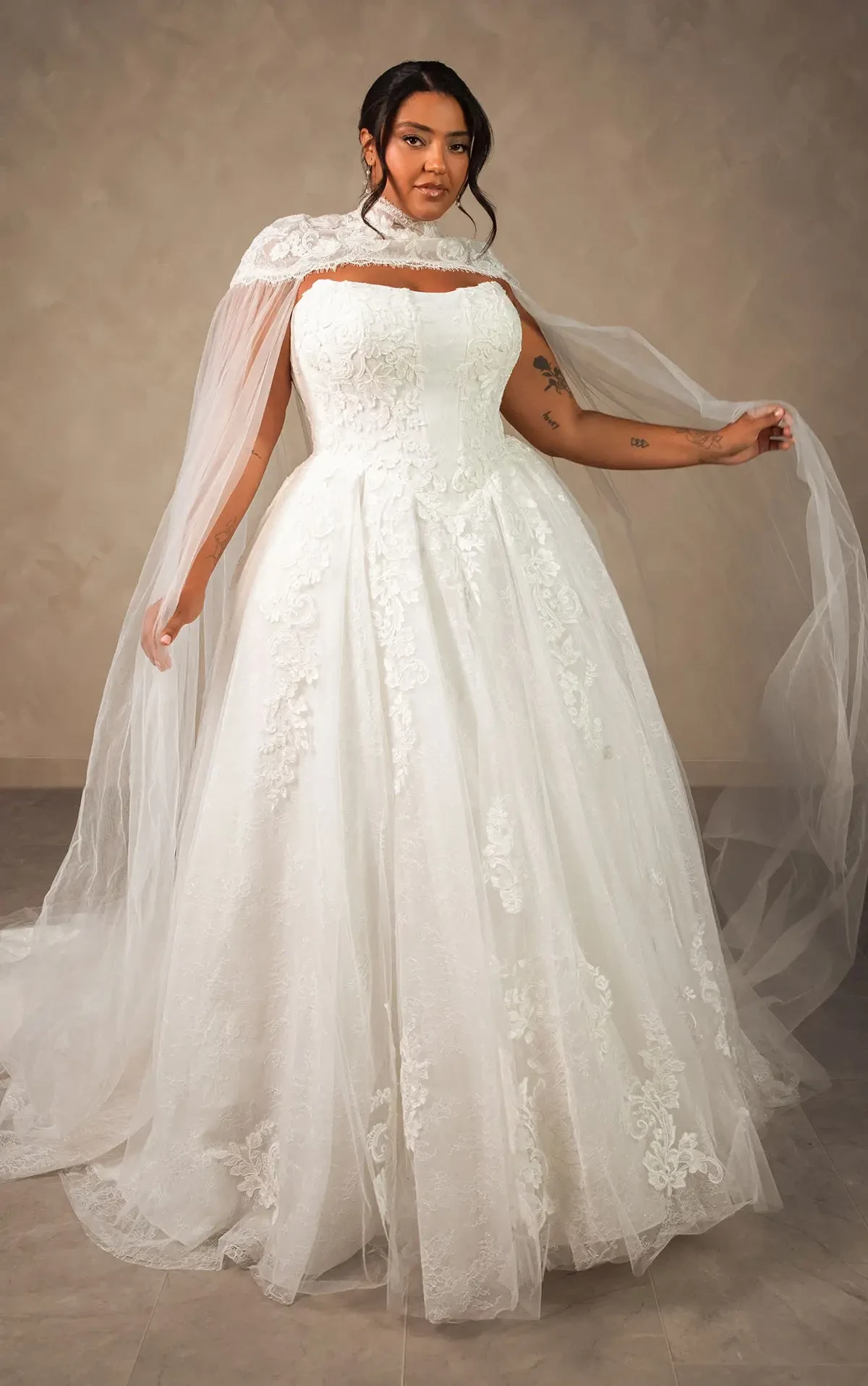 Essense of Australia D4553+ Plus Size Enchanting Strapless Ballgown with Regal High-Neck Cape - Ballgown wedding dress with soft tulle and lace appliqu&eacute;s