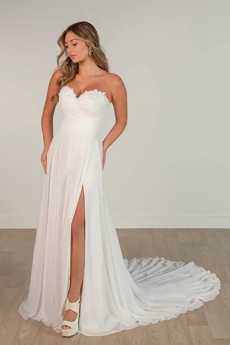 model is wearing a strapless bridal gown